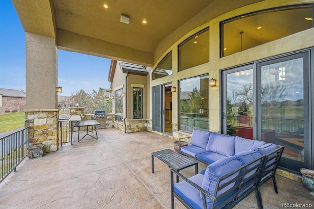 view of patio / terrace with area for grilling and an outdoor living space