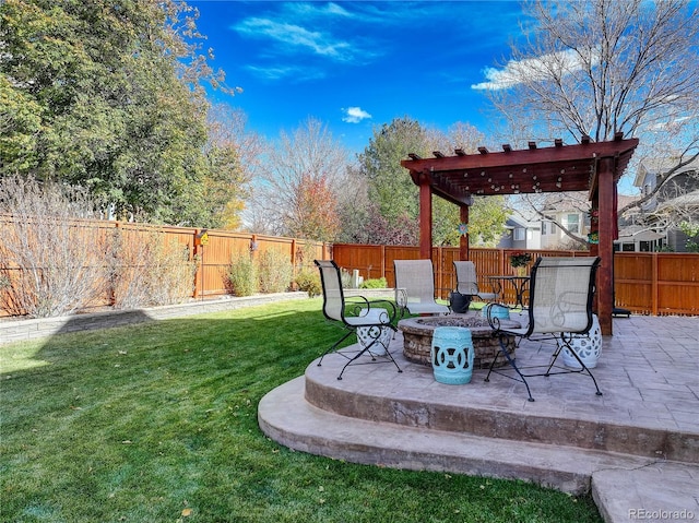 view of yard featuring a pergola, a patio, and a fire pit