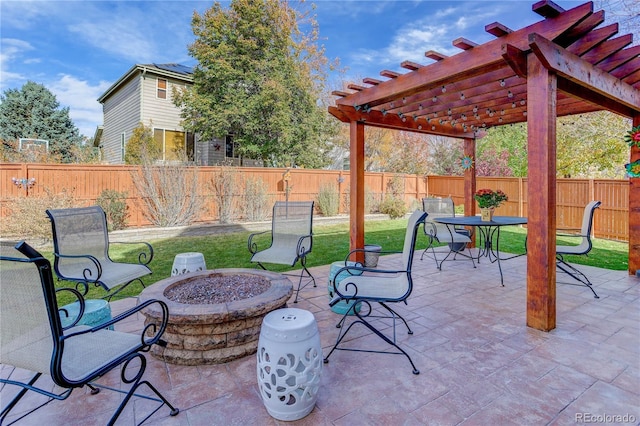 view of patio / terrace featuring a pergola and an outdoor fire pit