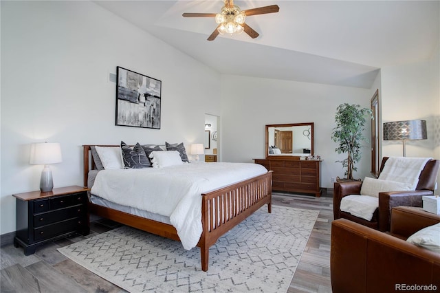 bedroom featuring ceiling fan, wood-type flooring, and lofted ceiling