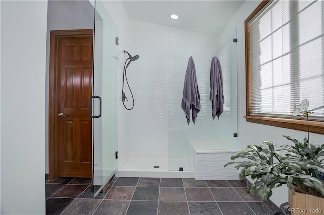 bathroom featuring an enclosed shower