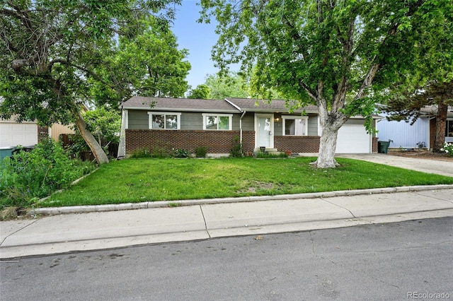 11625 Bellaire Way, Thornton, CO 80233 - ranch-style house with brick siding, driveway, a front lawn, and an attached garage
