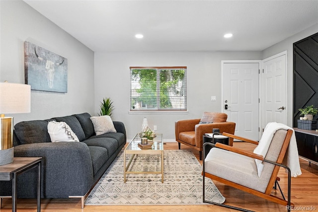 11625 Bellaire Way, Thornton, CO 80233 - living area with light wood finished floors and recessed lighting