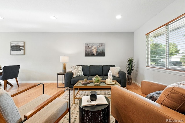 11625 Bellaire Way, Thornton, CO 80233 - living room featuring wood finished floors, recessed lighting, and baseboards