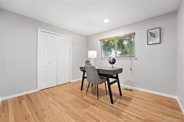 11625 Bellaire Way, Thornton, CO 80233 - home office with light wood-style flooring, baseboards, and recessed lighting