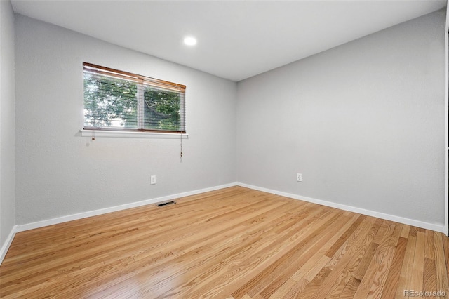 11625 Bellaire Way, Thornton, CO 80233 - unfurnished room featuring wood finished floors and baseboards