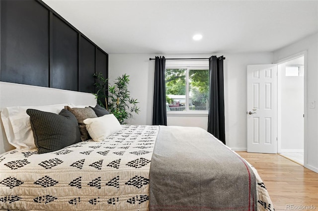 11625 Bellaire Way, Thornton, CO 80233 - bedroom with light wood-style floors, baseboards, and recessed lighting