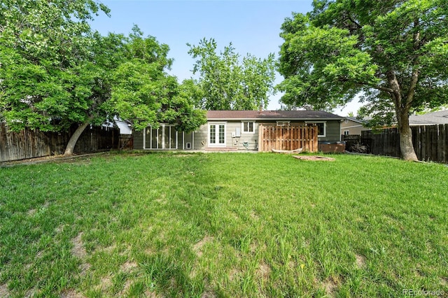11625 Bellaire Way, Thornton, CO 80233 - rear view of house featuring french doors