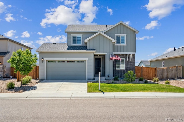 6954 E 117th Ave, Thornton, CO 80233 - traditional-style home with board and batten siding, driveway, roof with shingles, and a garage