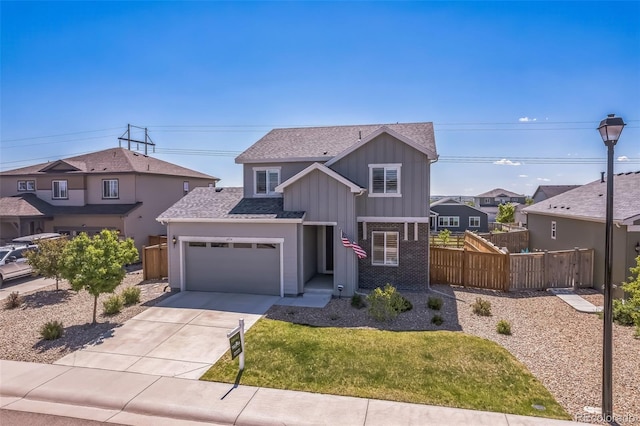 6954 E 117th Ave, Thornton, CO 80233 - traditional-style house with board and batten siding, a shingled roof, an attached garage, concrete driveway, and a residential view