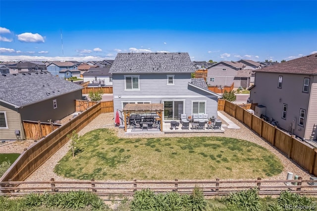 6954 E 117th Ave, Thornton, CO 80233 - back of property with a patio area and a residential view