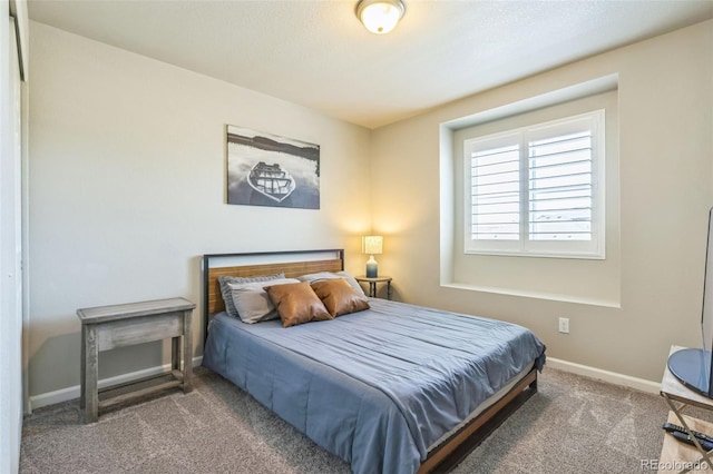 6954 E 117th Ave, Thornton, CO 80233 - carpeted bedroom featuring baseboards