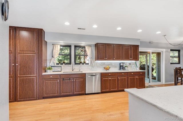 9591 State Highway 96, Westcliffe, CO 81252 - kitchen featuring dishwasher, light wood-type flooring, tasteful backsplash, plenty of natural light, and recessed lighting
