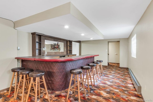 9591 State Highway 96, Westcliffe, CO 81252 - indoor bar featuring a baseboard heating unit, wood finished floors, and recessed lighting
