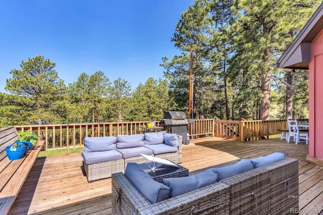 9591 State Highway 96, Westcliffe, CO 81252 - deck with an outdoor living space and area for grilling