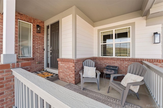 4464 E 139th Ave, Thornton, CO 80602 - entrance to property featuring a porch and brick siding