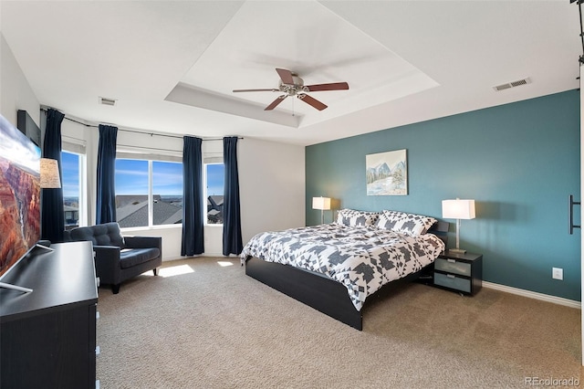 4464 E 139th Ave, Thornton, CO 80602 - carpeted bedroom with a raised ceiling, ceiling fan, and baseboards