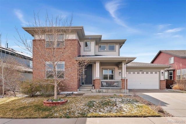 4464 E 139th Ave, Thornton, CO 80602 - view of front facade featuring brick siding, covered porch, driveway, and a garage