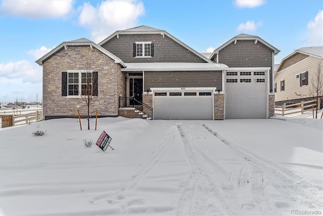 craftsman-style home featuring a garage