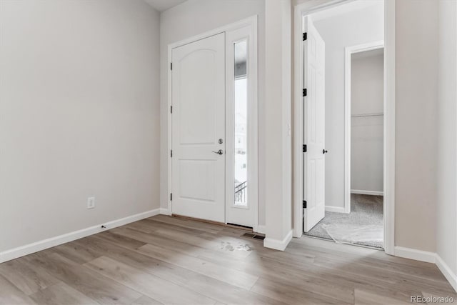 foyer entrance featuring light hardwood / wood-style floors