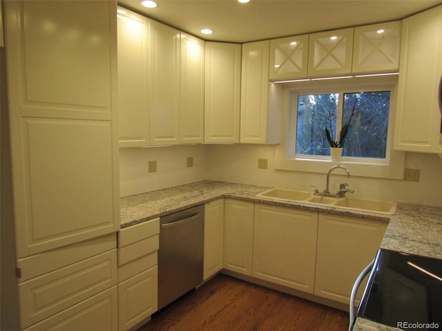 kitchen with dishwasher, white cabinets, sink, dark hardwood / wood-style flooring, and range