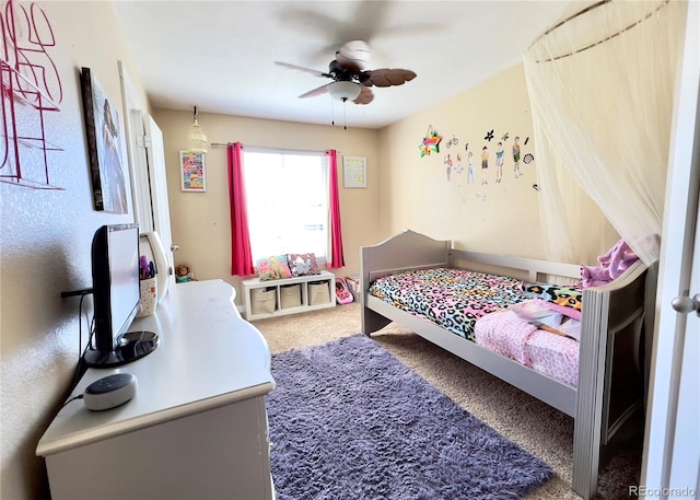 carpeted bedroom with ceiling fan