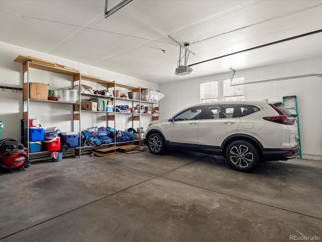 garage featuring a garage door opener