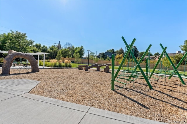 community play area featuring fence