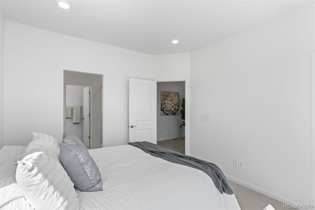 carpeted bedroom with baseboards and recessed lighting