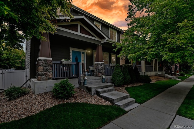 4578 Quandary Peak St, Brighton, CO 80601 - craftsman inspired home with a porch and stone siding