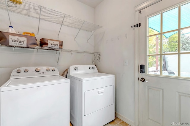 4578 Quandary Peak St, Brighton, CO 80601 - washroom featuring independent washer and dryer, plenty of natural light, and baseboards