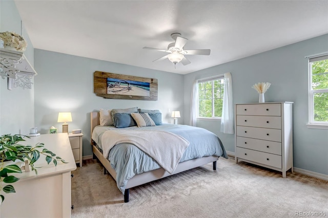 4578 Quandary Peak St, Brighton, CO 80601 - bedroom featuring baseboards, light colored carpet, and a ceiling fan