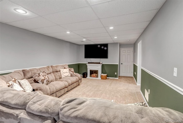 4578 Quandary Peak St, Brighton, CO 80601 - carpeted living area with a fireplace, recessed lighting, a drop ceiling, and baseboards