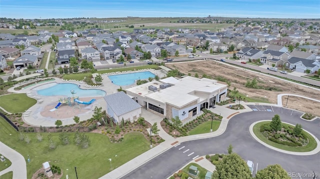 4578 Quandary Peak St, Brighton, CO 80601 - aerial perspective of suburban area featuring a pool area