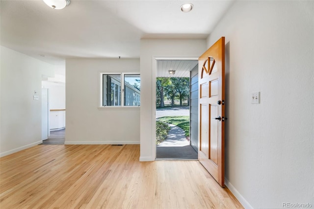 8813 Baseline Rd, Lafayette, CO 80026 - foyer entrance featuring light wood finished floors and baseboards