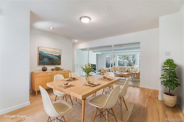 8813 Baseline Rd, Lafayette, CO 80026 - dining area with light wood-type flooring, baseboards, and recessed lighting