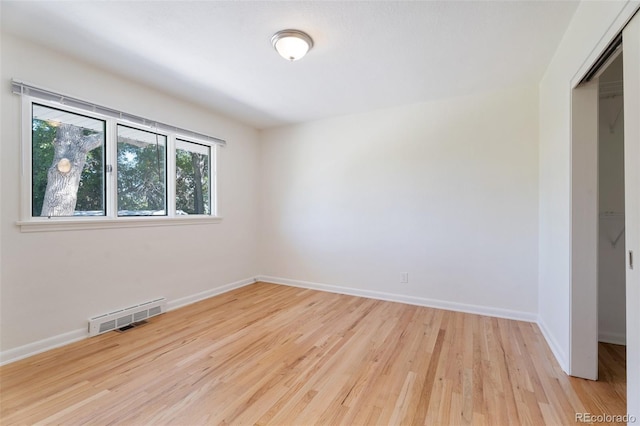 8813 Baseline Rd, Lafayette, CO 80026 - unfurnished room featuring wood finished floors and baseboards