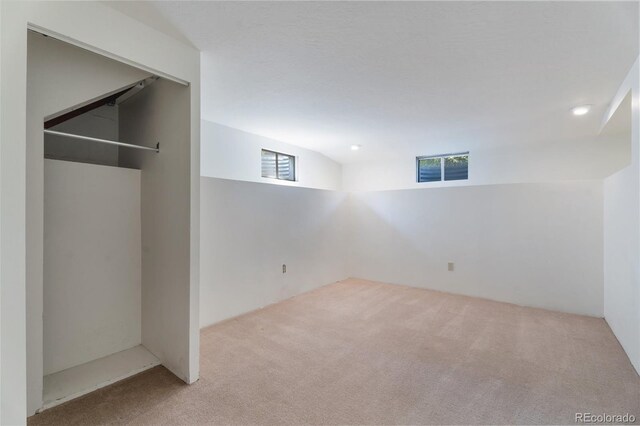 8813 Baseline Rd, Lafayette, CO 80026 - below grade area with carpet flooring and plenty of natural light