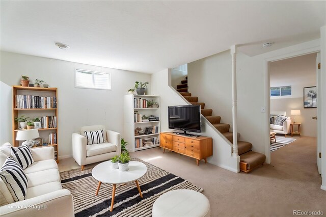 8813 Baseline Rd, Lafayette, CO 80026 - living area featuring stairway and light carpet
