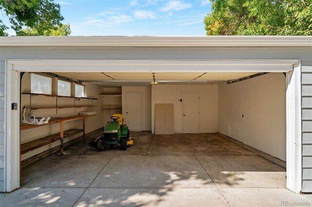 8813 Baseline Rd, Lafayette, CO 80026 - garage featuring driveway