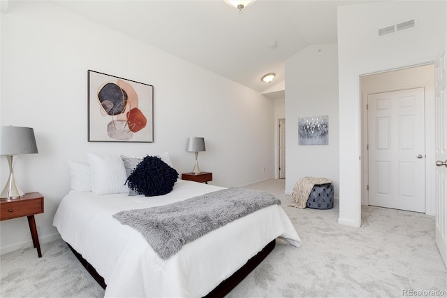 804 Summer Hawk Dr Unit 7301, Longmont, CO 80504 - bedroom featuring lofted ceiling, visible vents, and carpet flooring