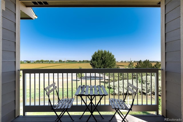804 Summer Hawk Dr Unit 7301, Longmont, CO 80504 - balcony featuring a rural view