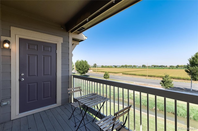 804 Summer Hawk Dr Unit 7301, Longmont, CO 80504 - wooden terrace with a rural view
