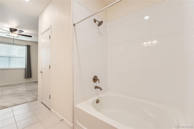 full bath featuring a ceiling fan, shower / bath combination, baseboards, and tile patterned floors