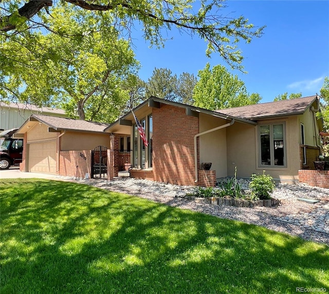 7019 S Windermere St, Littleton, CO 80120 - view of front of property featuring an attached garage, brick siding, a front lawn, and stucco siding