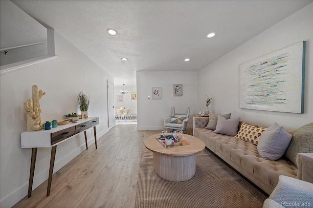 living room with light hardwood / wood-style floors