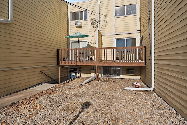 rear view of property with a deck