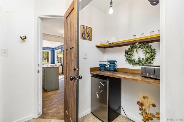 377 Homestead Rd, Bailey, CO 80421 - bar area with refrigerator and baseboards