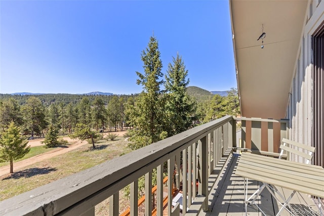 377 Homestead Rd, Bailey, CO 80421 - balcony with a wooded view and a mountain view