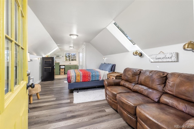 377 Homestead Rd, Bailey, CO 80421 - bedroom with wood finished floors and vaulted ceiling